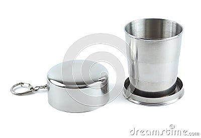 Steel folding cup near cover with key ring Stock Photo