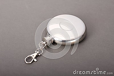 Steel folding cup near cover with key ring Stock Photo