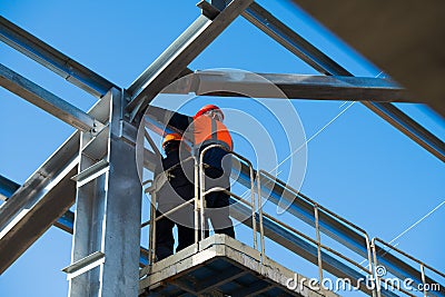 Steel frame workshop is under construction against a blue sky Stock Photo