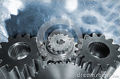 Steel gears and blue titanium Stock Photo