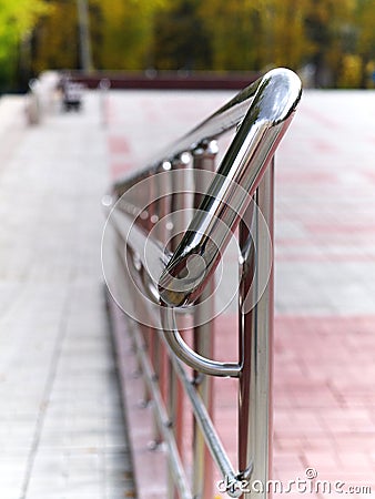 Steel handrails of wheelchair ramp Stock Photo