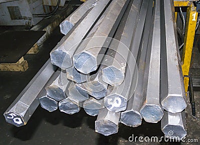 Steel hexagon bars in warehouse Stock Photo