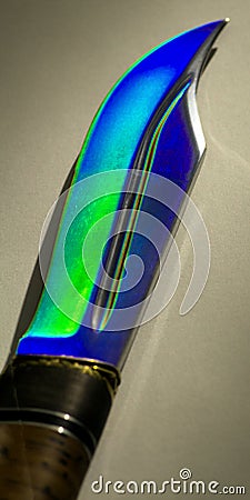 Steel knife blade treted by laser radiation for hardening Stock Photo