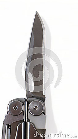 A steel multi-tool with an open knife blade lies on a white background. Pocket open folding knife. Portable multitasking Stock Photo