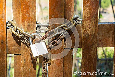 Steel padlock and rusty chain Stock Photo