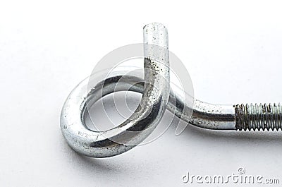 Steel pigtail screw hook on white background. Stock Photo