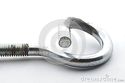 Steel pigtail screw hook on white background. Stock Photo