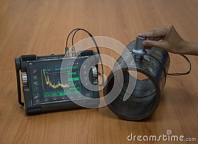Steel pipe inspection by ultrasonic test for found internal defect Stock Photo