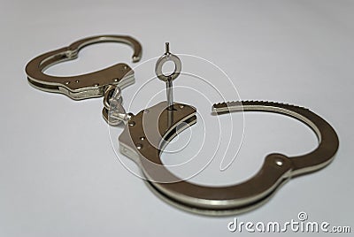 Steel police handcuffs Stock Photo