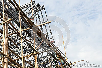 Steel roof truss workers. Stock Photo