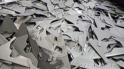 Steel scrap, steel sheet waste form transmutation blanking process Stock Photo