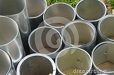 Steel sheet rolls stored in factory yard Stock Photo