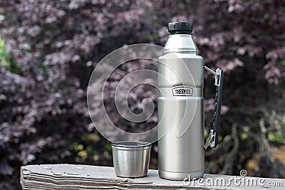 Steel thermos from TERMOS close-up. Space for text Editorial Stock Photo