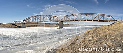 Hays Bridge across the Frozen Bow River Stock Photo