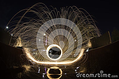 Steel wool light painting at a skate park ramp Stock Photo