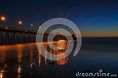 Steel Wool Spinning at the Imperial Beach Pier Stock Photo