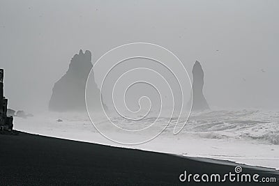 Steep cliffs on beach monochrome landscape photo Stock Photo