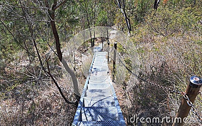 Steep metal staircase on Mt Cooroora hiking trail Stock Photo