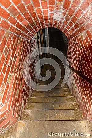 Steep stairs in the tunnel Stock Photo