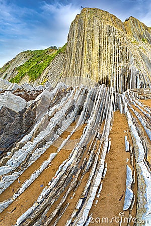 Steeply-tilted Layers of Flysch, Basque Coast UNESCO Global Geopark, Spain Stock Photo