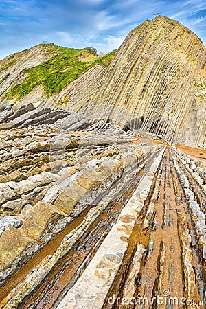 Steeply-tilted Layers of Flysch, Basque Coast UNESCO Global Geopark, Spain Stock Photo