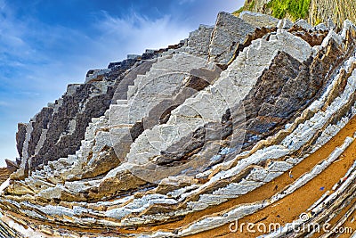 Steeply-tilted Layers of Flysch, Basque Coast UNESCO Global Geopark, Spain Stock Photo