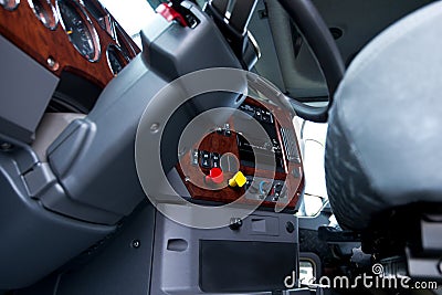 Steering column and dashboard in cab of semi truck Stock Photo