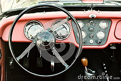 Steering wheel and dashboard in historic vintage car, photo filter Stock Photo