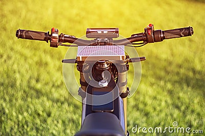 Steering wheel electric bike with monitor and suspension fork Stock Photo