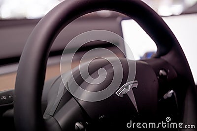 steering wheel Tesla model Y electric car, Driver's column, modern passenger car, interior features such Control wheel Editorial Stock Photo
