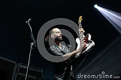 Placebo british band bass/guitar lead player Stefan Olsdal during show Editorial Stock Photo