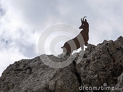 Steinbock silhouette in tofane dolomites mountains panorama Stock Photo