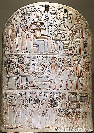 Stela of Qeh including a priest offering food and drink to gods and death person Editorial Stock Photo