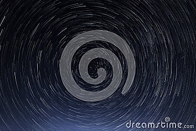 Stellar trails the rotation of bright stars at night around the Polar Star Stock Photo