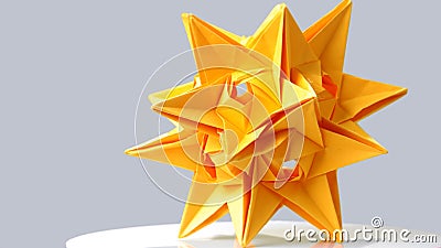 Stellated dodecahedron origami on grey background. Stock Photo