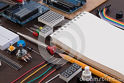 STEM education or DIY Electronic Kit , Robot made on base of micro controller with variety of sensor and tools. Closeup. Stock Photo