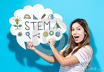 STEM text with young woman holding a speech bubble Stock Photo