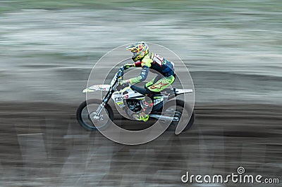 High-speed shot of a rider on a motocross trail in Stendal, Germany with long exposure Editorial Stock Photo