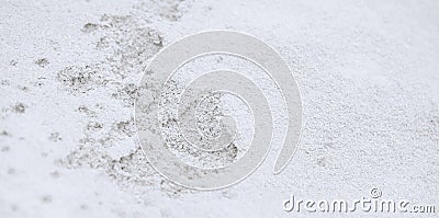 A step against snow background. footprint on white snow background. Stock Photo