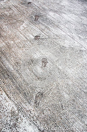 the step footprint of man on the concrete rough floor or ground Stock Photo