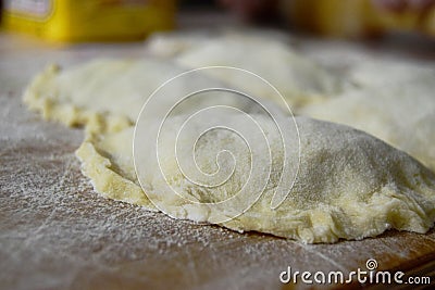 Step-by-step recipe for cooking pies with onions. the concept of home-made village cuisine, step4, selective focus. Stock Photo
