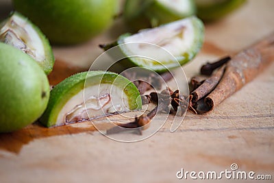 Step-by-step recipe for preparing Italian liquor nocino from green walnuts at home, real home kitchen and cooking, selective focus Stock Photo
