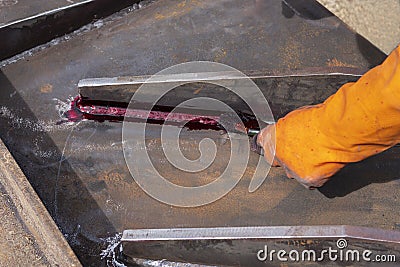 Step to use brush apply Liquid Penetrant into the welded for Non-Destructive Testing& x28;NDT& x29; with process Penetrant Testing Stock Photo