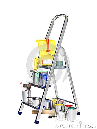 Stepladder with paint cans and brushes Stock Photo