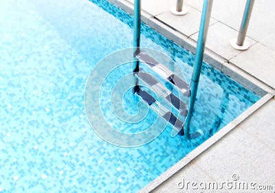 Steps into blue pool Stock Photo