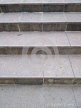 Steps of natural stone motifs and textures in a city park Stock Photo