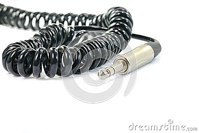 Stereo audio headphone jack with cable on white background. Stock Photo