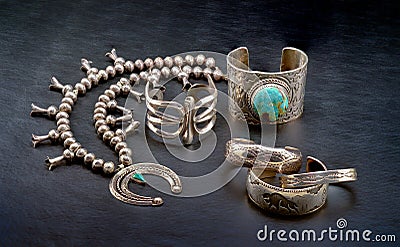 Sterling Silver Native American Jewelry on a black background. Stock Photo