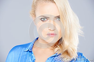 Stern angry blond woman Stock Photo