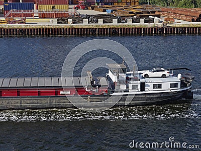 The stern of the Cetera showing a car parked on the Accommodation deck of this Dutch River Barge Editorial Stock Photo